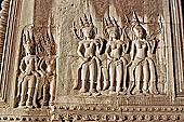 Angkor Wat temple, second enclosure, devatas sculpted in bas-relief with an extraordinary variety of intricate hair styles and costumes. 